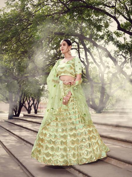 Women's  Pista Green Soft Net Heavy Embroidered Lehenga - Myracouture