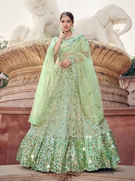 Women's  Pista Green Soft Net Heavy Embroidered Lehenga - Myracouture