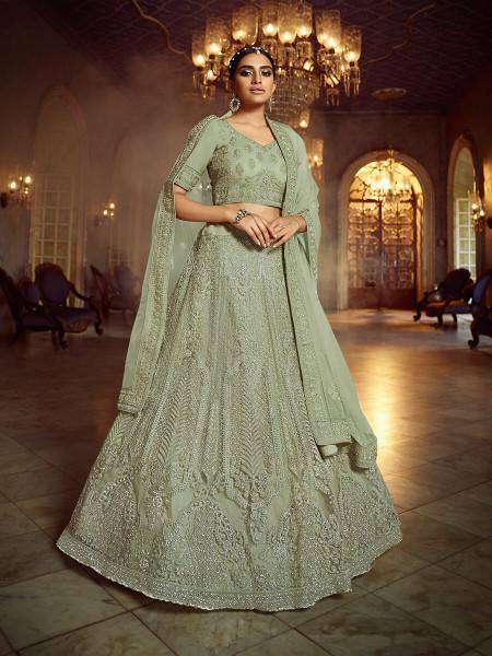 Women's  Green Soft Net Heavy Embroidered Lehenga - Myracouture