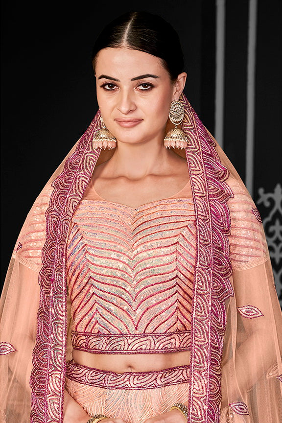 Peach Net Embroidered Semi Stitched Lehenga Choli