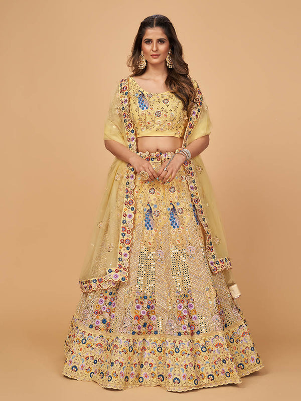 Women's Yellow Soft Net Heavy Embroidered Designer Lehenga - Myracouture