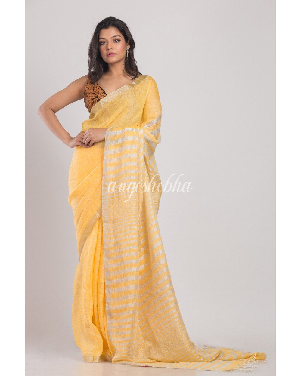 Women's Yellow Handwoven Linen Saree - Angoshobha