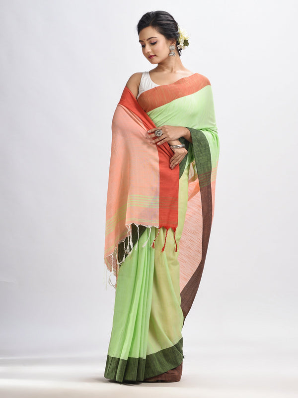 Women's Light green cotton with solid body in tawny peach pallu handloom saree - Angoshobha