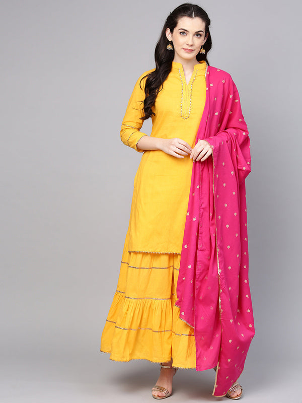 Yellow Solid Kurta With Sharara And Dupatta.