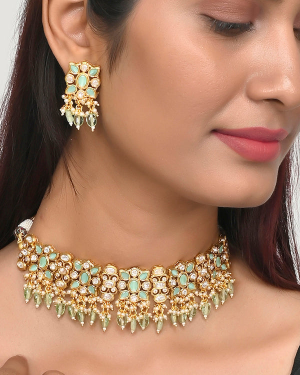 Women's Oval Cut Faux Kundan Adorned Brass Gold Toned Jewellery Set - Voylla