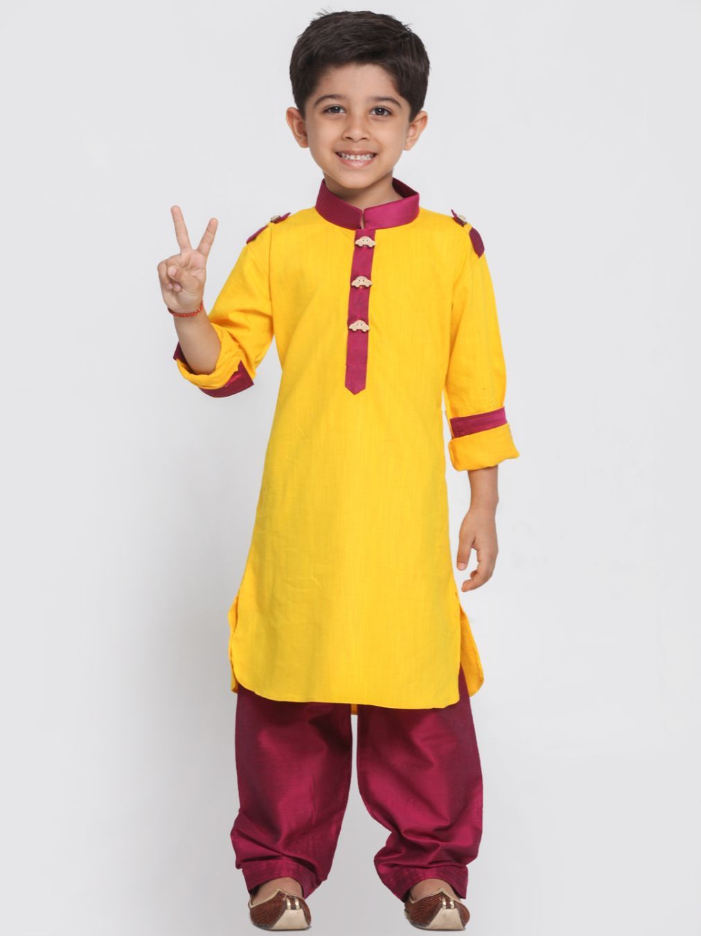 Yellow-maroon pathani suit looks gorgeous