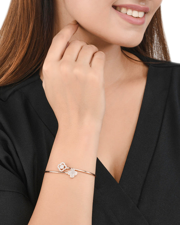 Women's Sparkling Elegance Four Leaf Clover Zircons Adorned Rose Gold Plated Brass Bracelet - Voylla