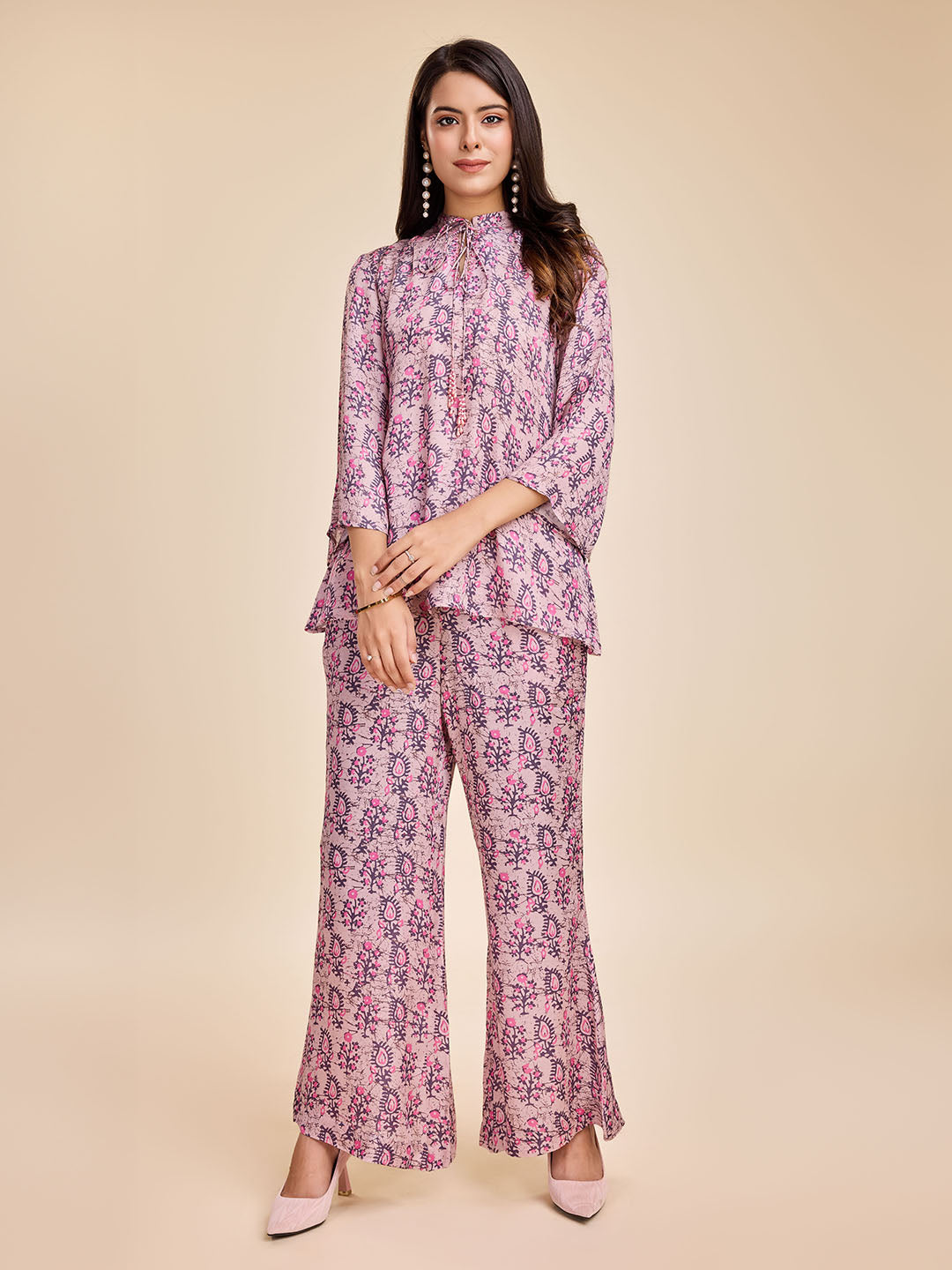 Women's Stylish Floral Printed Shirt With Long Cuff Sleeves And Round Tie-Up Embellished Neck & A Mid-Rise Flared Pants Coord Set In Modal Satin- Pink - Komarri