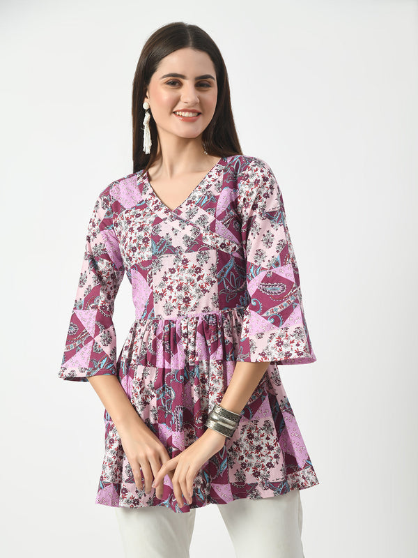 Women's Pink Printed Flared Short Kurti With Angrakha Style - Taantav