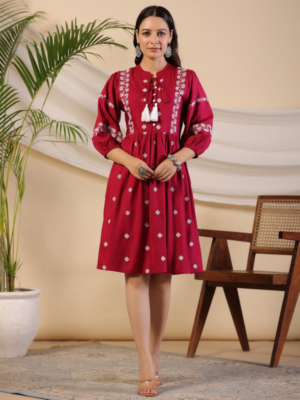 Jashvi Rayon Wine Cross Stitched Embroidered Short Dress With Dori Tie Ups & Tassels