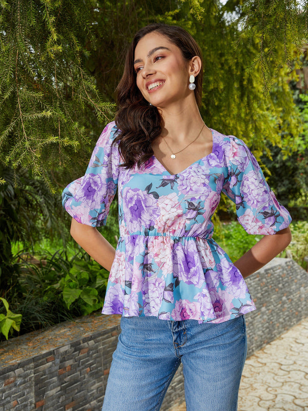 Women's Turquoise Floral Back Criss Cross Peplum Top - SASSAFRAS