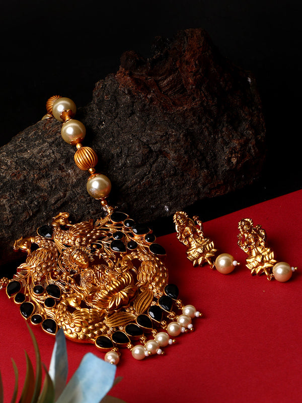 Women's Antique Matte Gold Finish Goddess Laxmi Black Stone Studded Temple Jewellery set - Anikas Creation