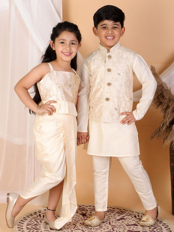 Jashvi Cream And Gold Silk Blend Siblings Set