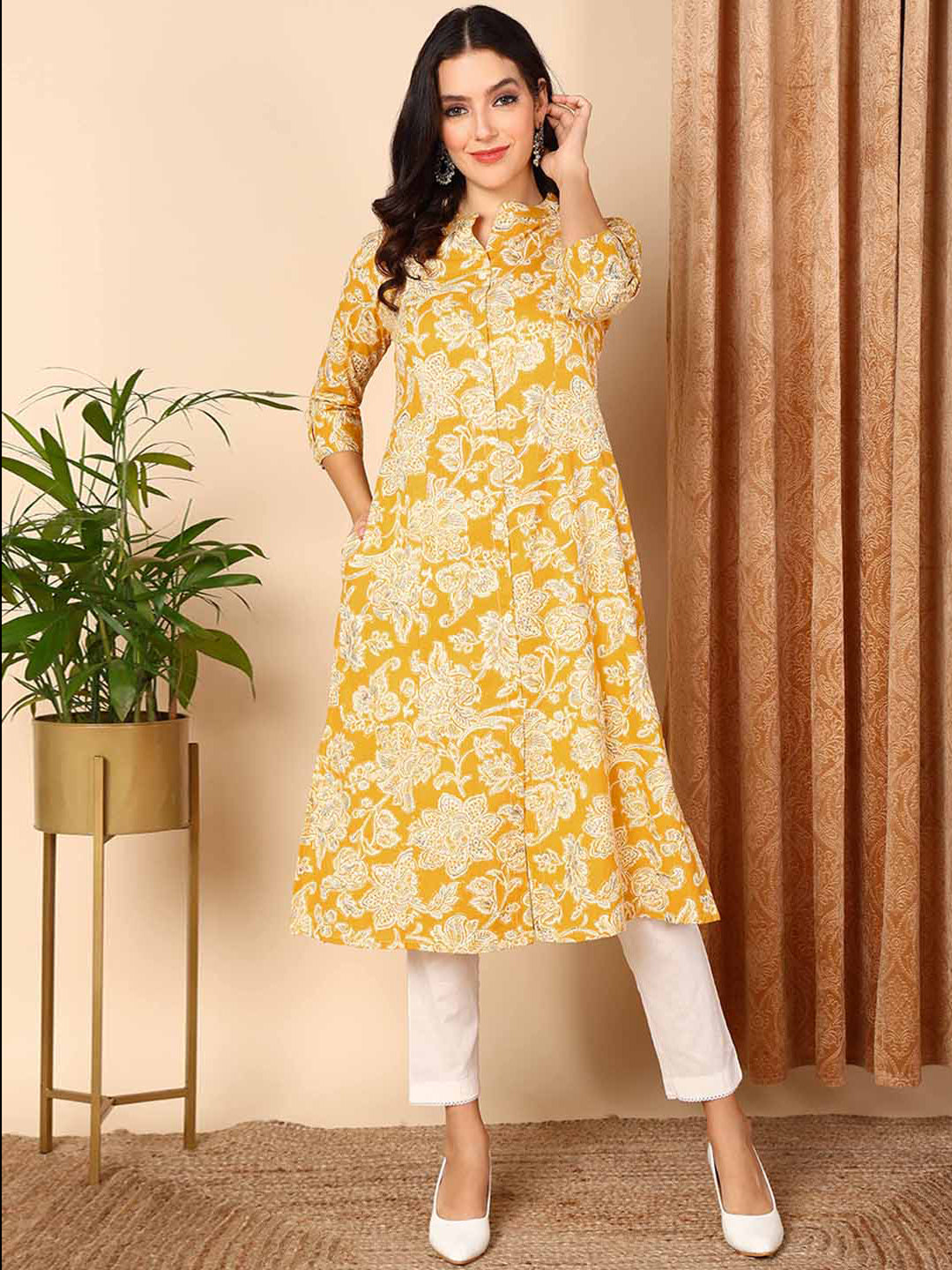 Women's Yellow Cotton Floral Printed Flared Kurta - Ahika