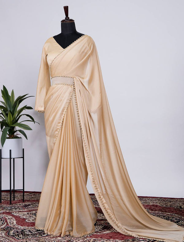 Pastel Brown Plain Rangoli Silk Saree With Pearl Lace Border