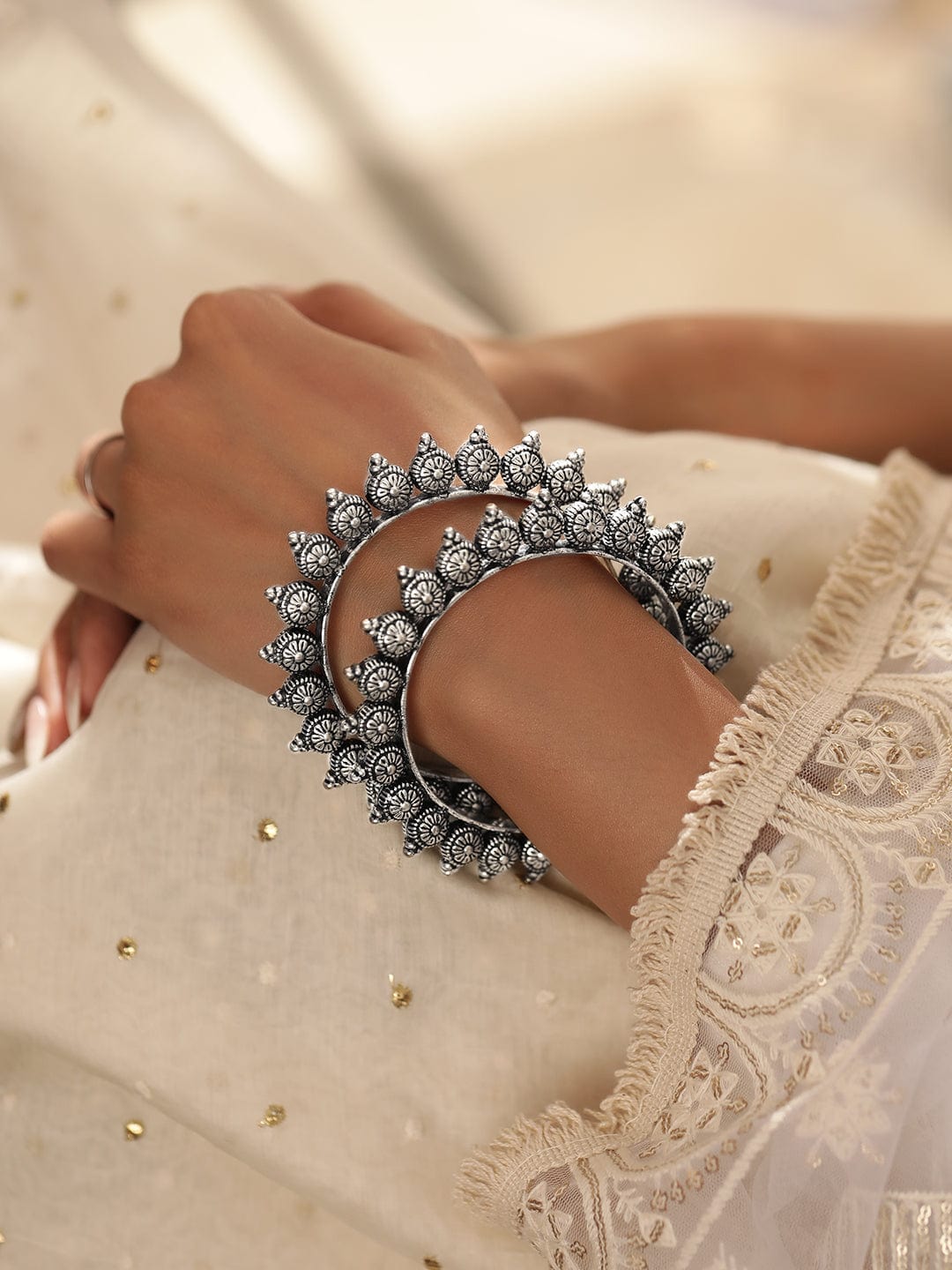 Rubans Set of 2 Oxidized Silver plated Bangles with Lotus Motif Bangles & Bracelets