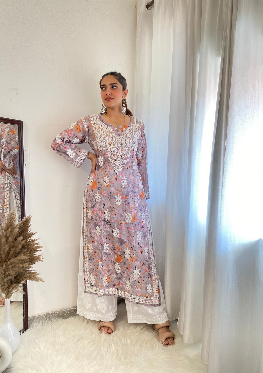 Zarah Mulmul Straight kurta with heavy chikankari embroidery and mulmul cotton in orange colour