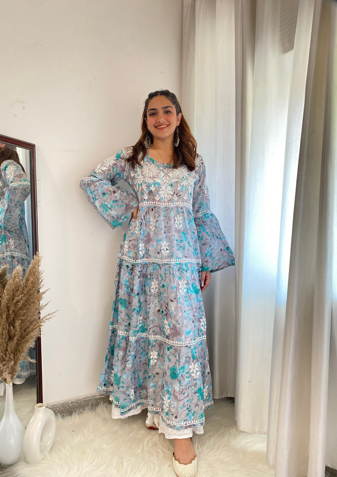 Zarah Mulmul Tiered Gown with heavy chikankari embroidery and mulmul cotton in blue colour