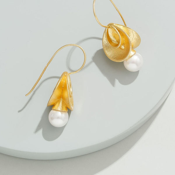 Yellow Earrings Embellished With White Pearl