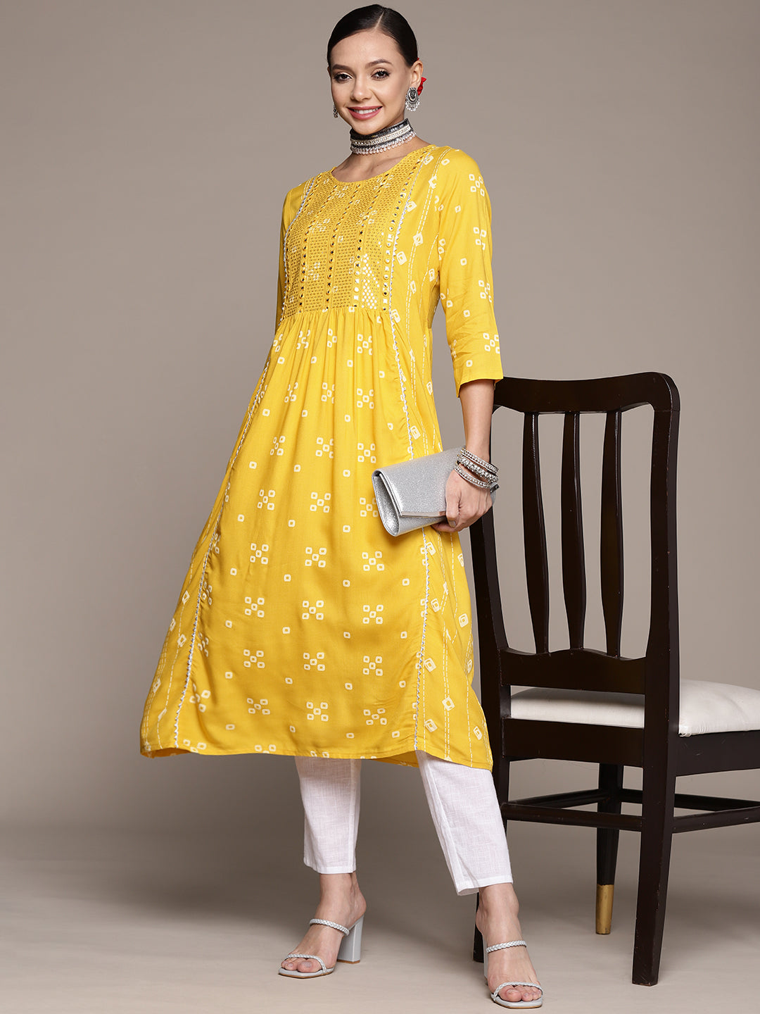 Women's Yellow Mirrorwork Sequinned Flared Kurta - Anubhutee