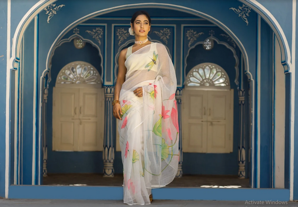 Women's Featuring A Sea Green Saree In Chanderi Base With Hand Painted Pink Flower Motifs - Pheeta