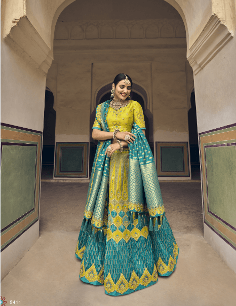 Trendy Heavy Embroidered Silk Designer Wedding Wear Lehenga In Blue And Yellow - Indiakreations