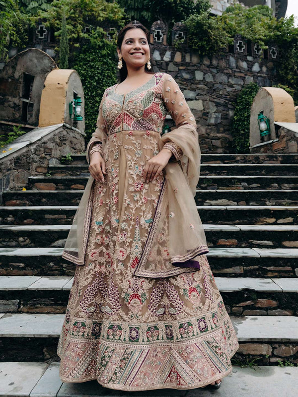 Majestic Ochre Unstitched Lehenga Adorned With Traditional Ethnic Motifs All Over