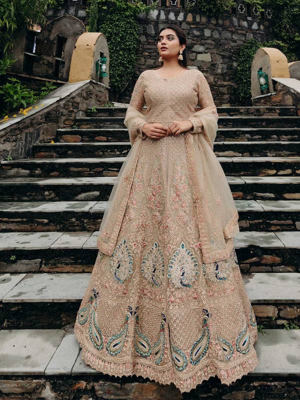 Alluring Ochre Yellow Lehenga Enriched With Peacock Motifs And Detailing All Over