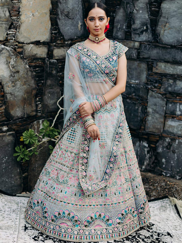 Dreamy Pine Green Unstitched Lehenga Heavily Embellished With Traditional Indian Motifs