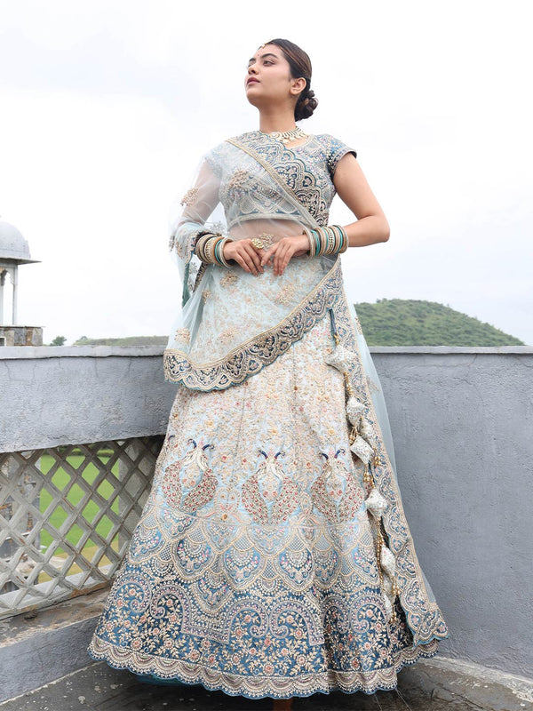 Gorgeous Pine Green Lehenga Set With Minimal Detailing & Traditional Peacock Motifs