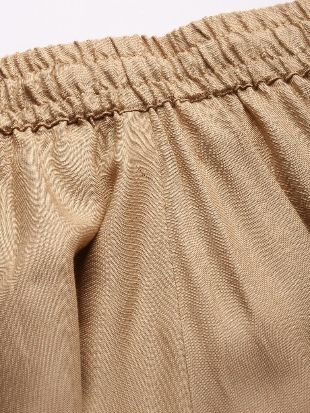 Varanga Women Beige Solid Flared Palazzos - Indiakreations