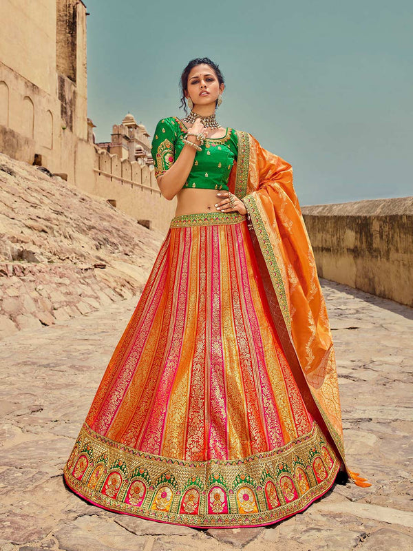 Flowy Pink & Orange Lehenga With Heavily Embellished Green Blouse & Dupatta