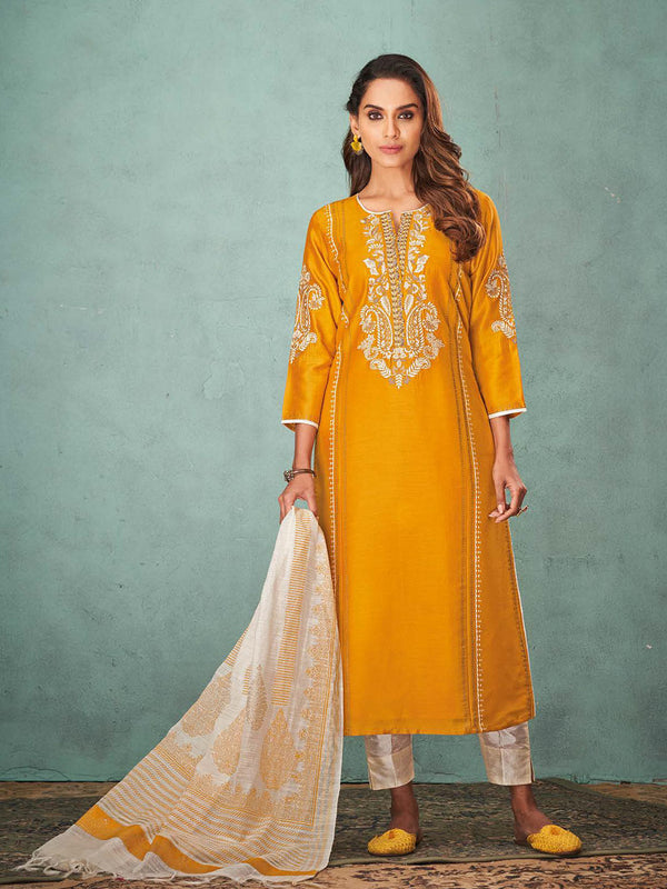 Mustard Yellow Silk Salwar Suit Adorned With Rich White Embroidery