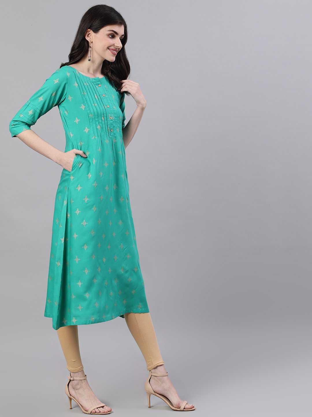 Women Green Calf Length Three-Quarter Sleeves A-Line Ethnic Motifs Printed Viscose Rayon Kurta | NOZ2TOZ - Made In INDIA.