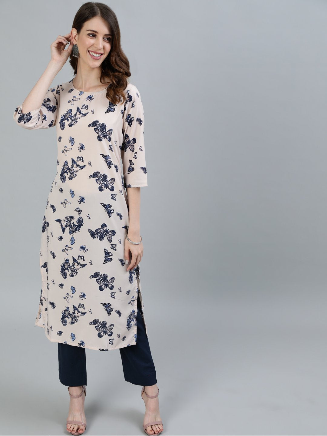 Women Peach Printed Straight Kurta With Three Quarter Sleeves | NOZ2TOZ - Made In INDIA.