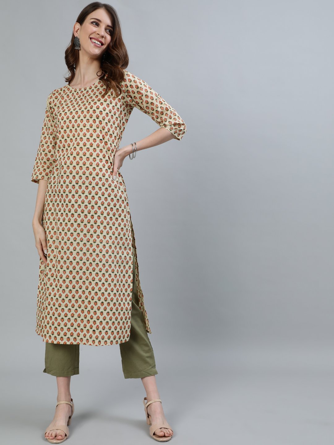 Women Beige Printed Straight Kurta With Three Quarter Sleeves | NOZ2TOZ - Made In INDIA.