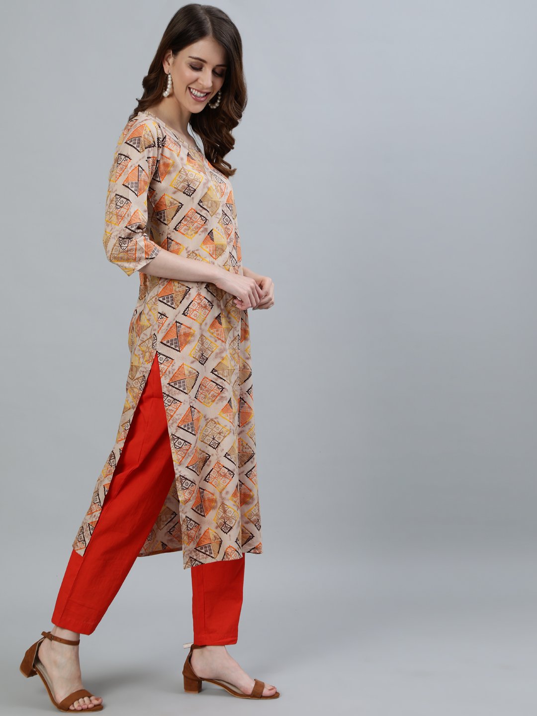 Women Beige Printed Straight Kurta With Three Quarter Sleeves | NOZ2TOZ - Made In INDIA.