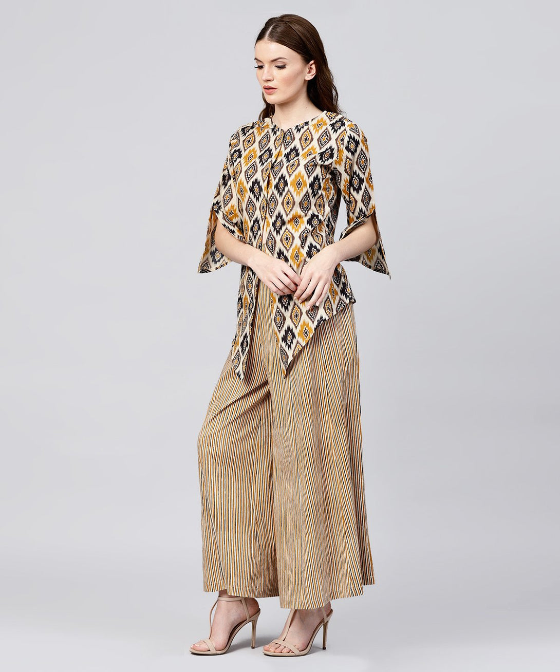 Yellow printed 3/4th sleeve cotton Assymetric tops with striped flared skirt | NOZ2TOZ - Made In INDIA.