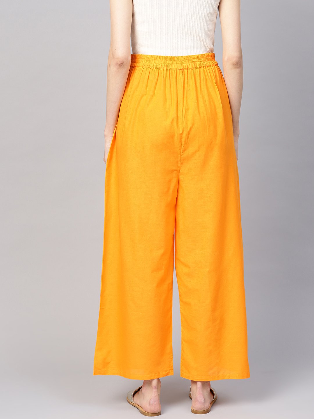 Women Orange Solid Wide Leg Palazzos | NOZ2TOZ - Made In INDIA.