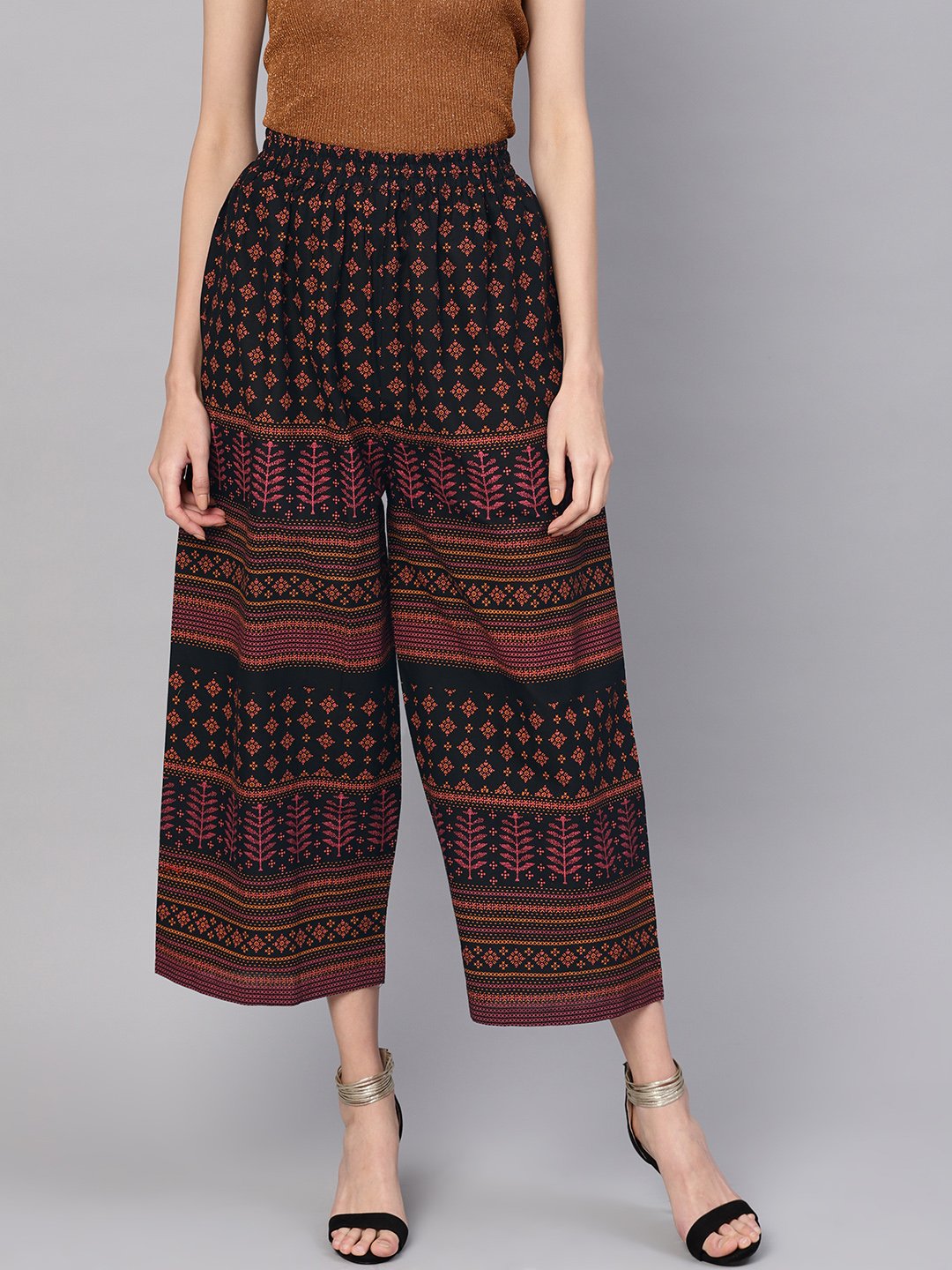 Women Black & Orange Printed Cropped Straight Palazzos | NOZ2TOZ - Made In INDIA.