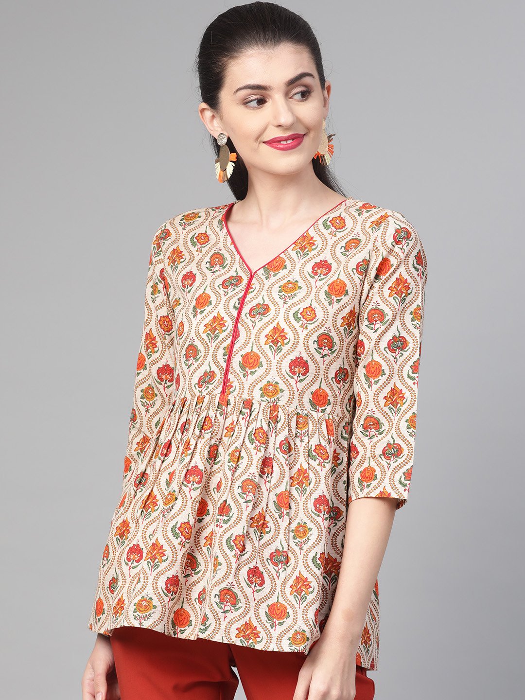 Women Cream & Orange Cotton Printed V-Neck Tunic | NOZ2TOZ - Made In INDIA.