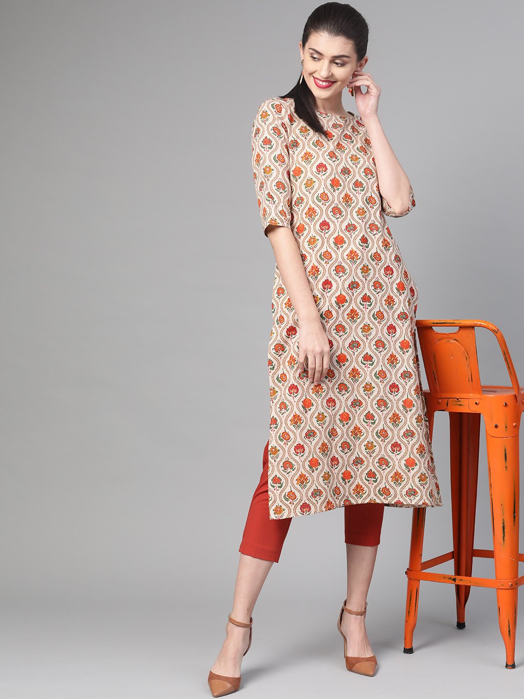 Women Cream & Orange Cotton Straight Floral Printed Kurta | NOZ2TOZ - Made In INDIA.