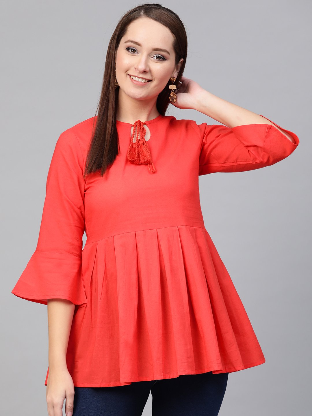 Women Red solid Tie-up Neck Peplum Top | NOZ2TOZ - Made In INDIA.