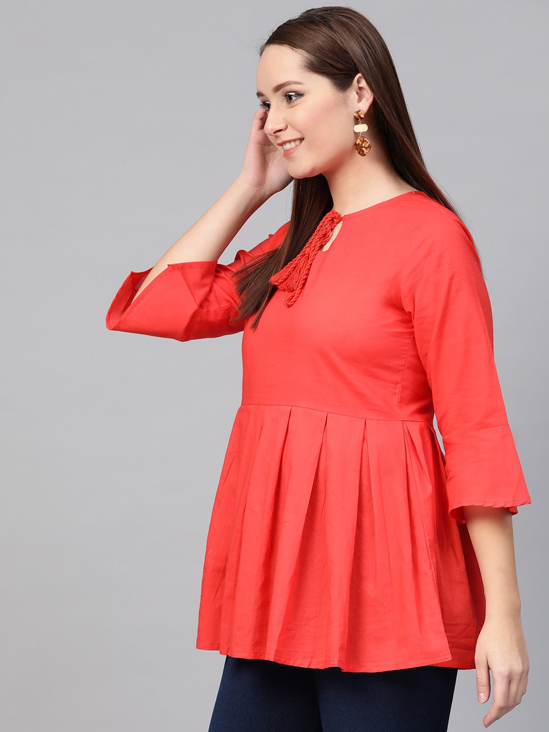 Women Red solid Tie-up Neck Peplum Top | NOZ2TOZ - Made In INDIA.