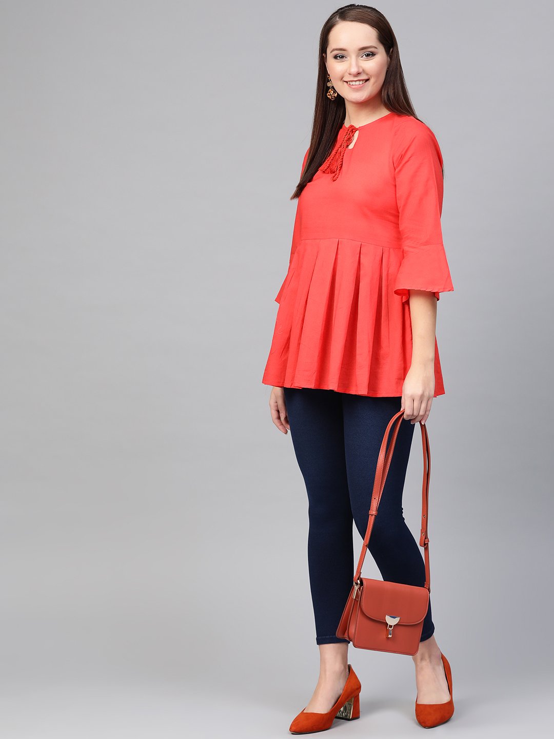 Women Red solid Tie-up Neck Peplum Top | NOZ2TOZ - Made In INDIA.