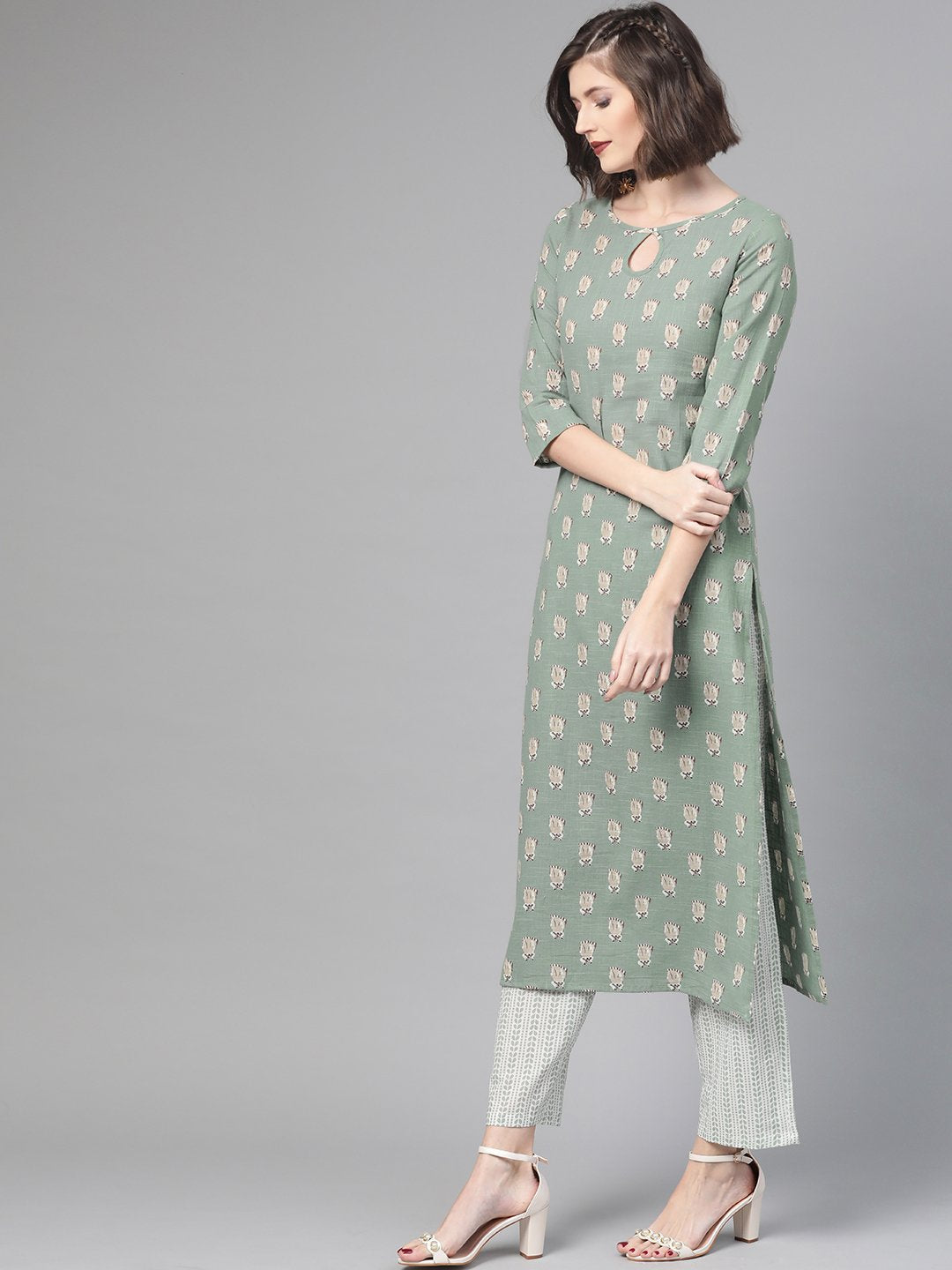 Women Green & Beige Straight Quirky Printed Kurta And Trousers Set | NOZ2TOZ - Made In INDIA.