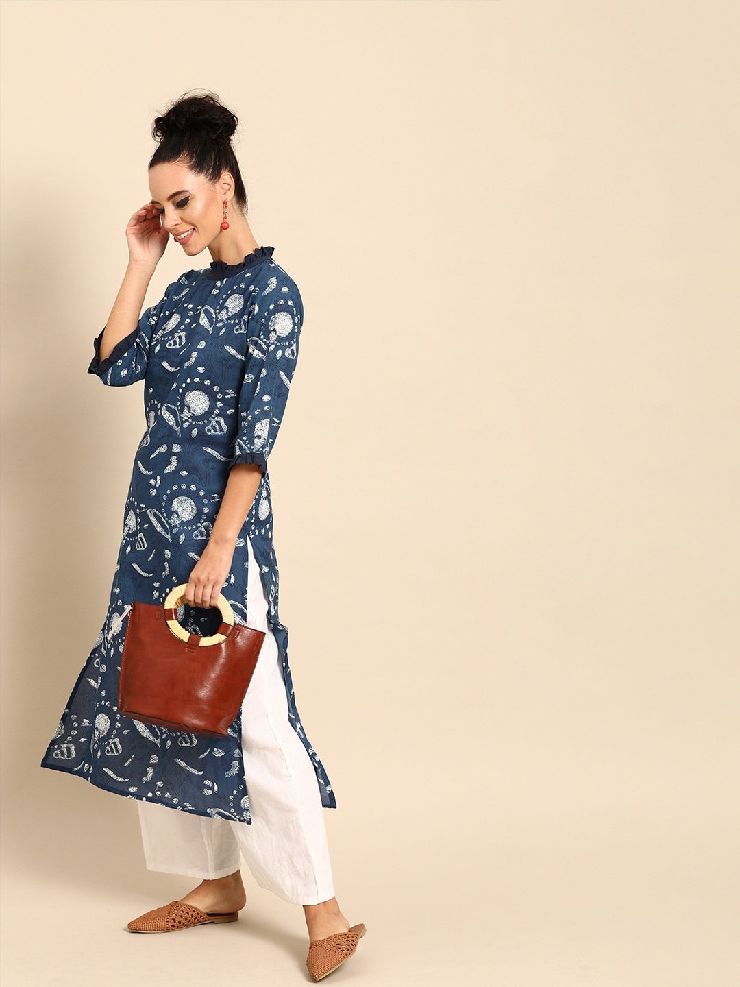 Women Blue Printed Straight Kurta With Three Quarter Sleeves | NOZ2TOZ - Made In INDIA.