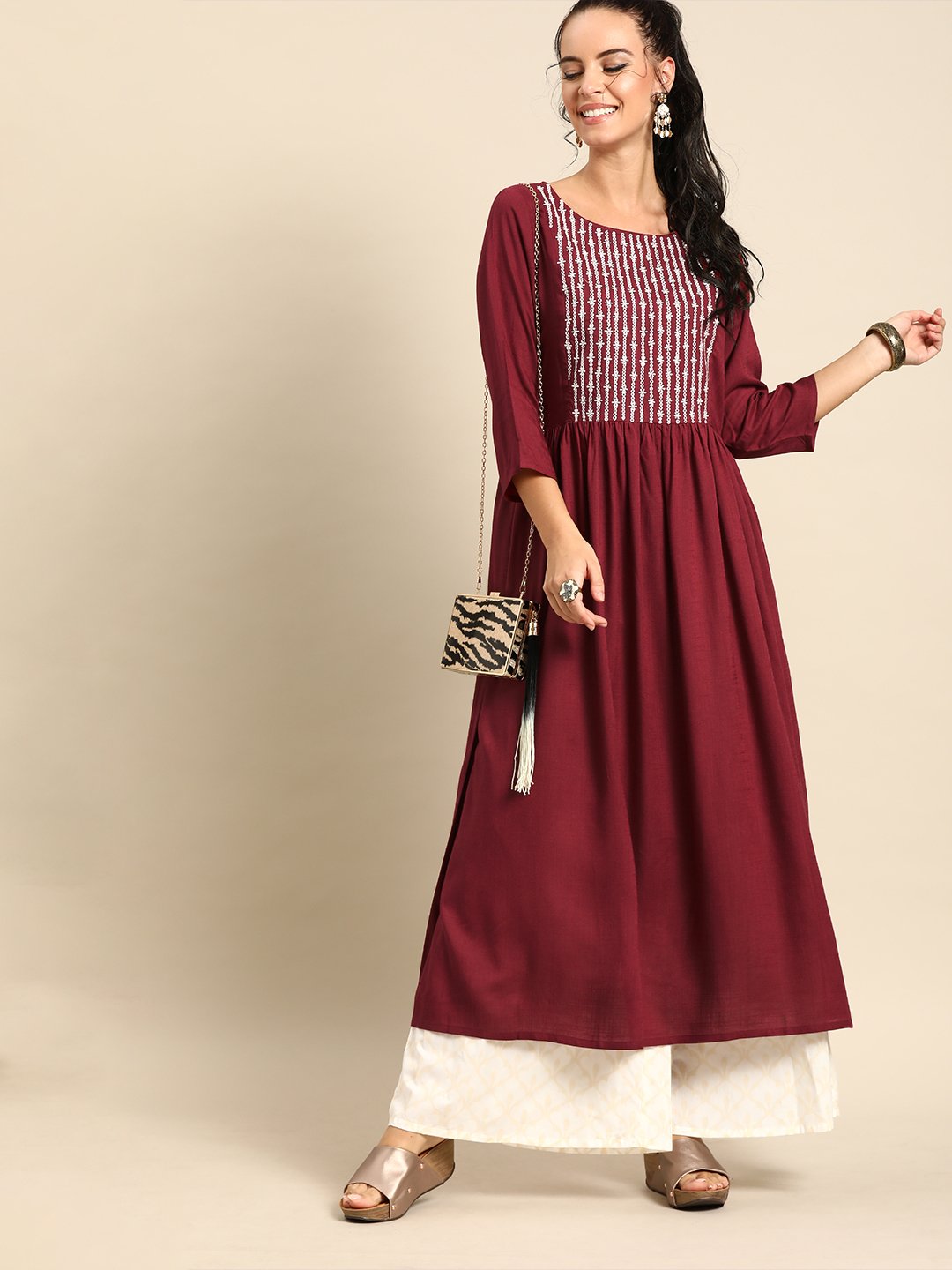 Women Maroon Calf Length Three-Quarter Sleeves A-Line Solid Yoke Design Viscose Rayon Kurta | NOZ2TOZ - Made In INDIA.