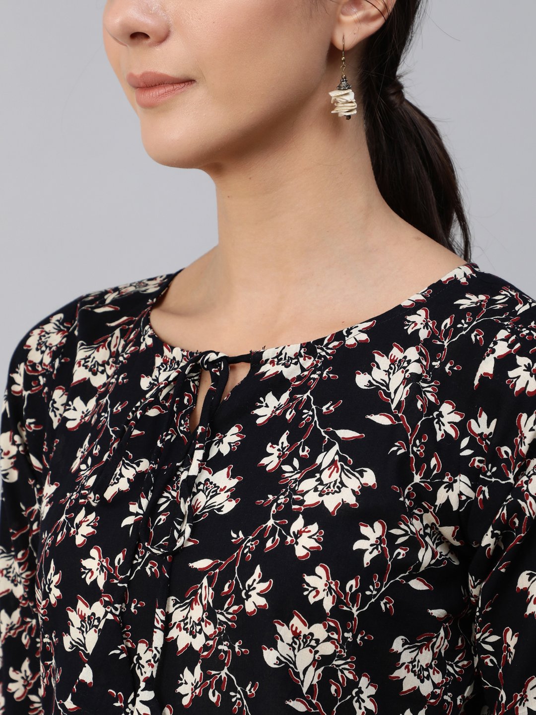 Women Black Floral Printed Top With Three Quarter Flared Sleeves | NOZ2TOZ - Made In INDIA.