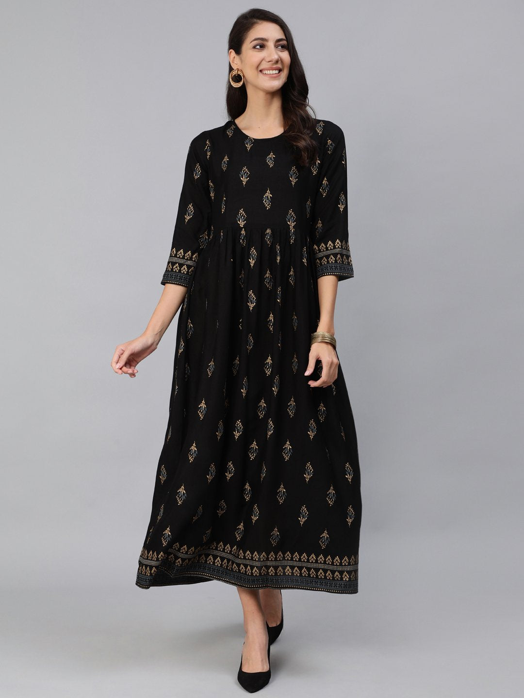 Women Black & Gold Printed Maxi Dress With Three Quarter Sleeves | NOZ2TOZ - Made In INDIA.